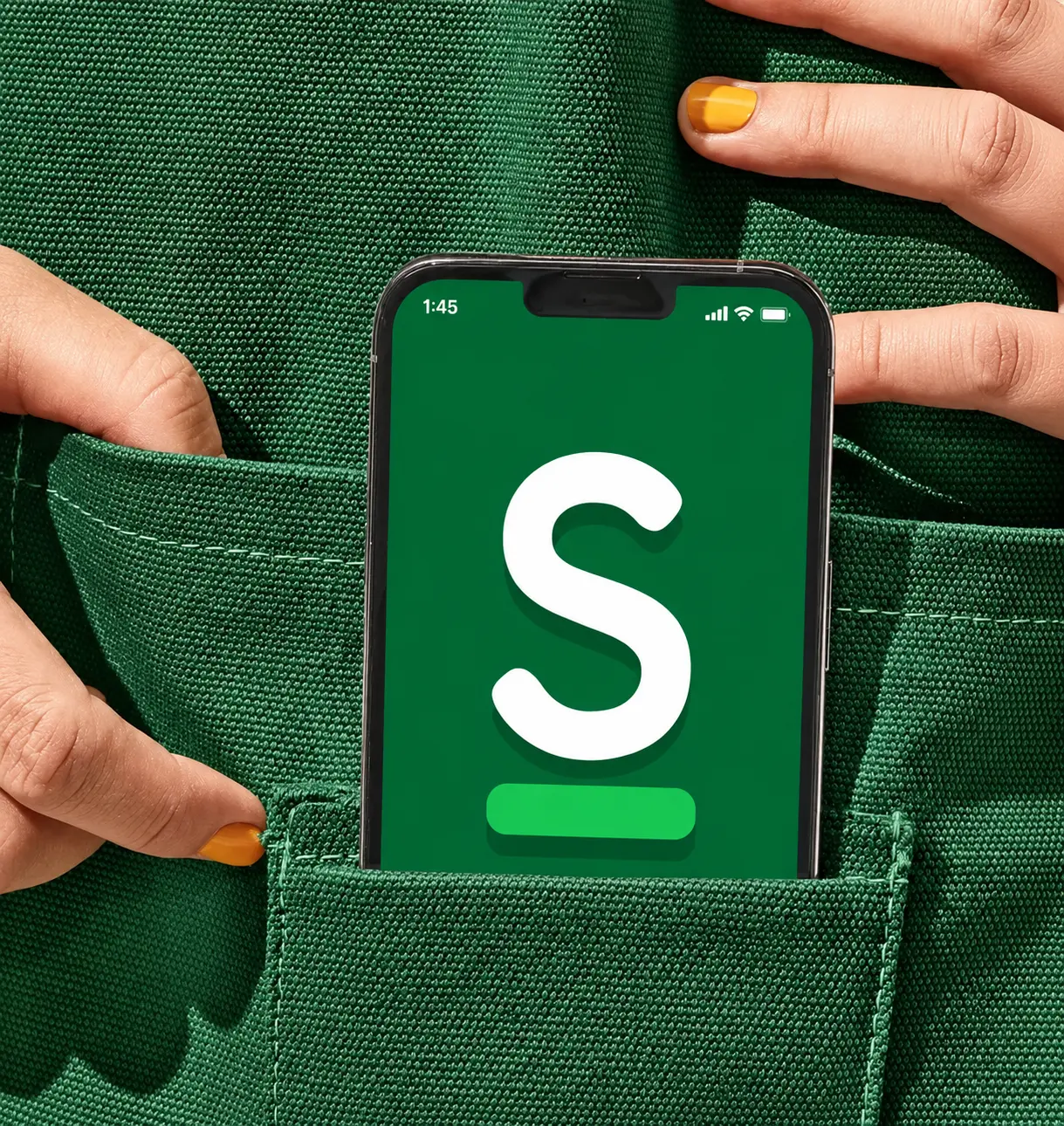 Téléphone avec le logo Stockline en poche, application de gestion de stock